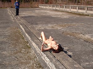 Lingerie-wearing babe roams the highway while 100% naked too